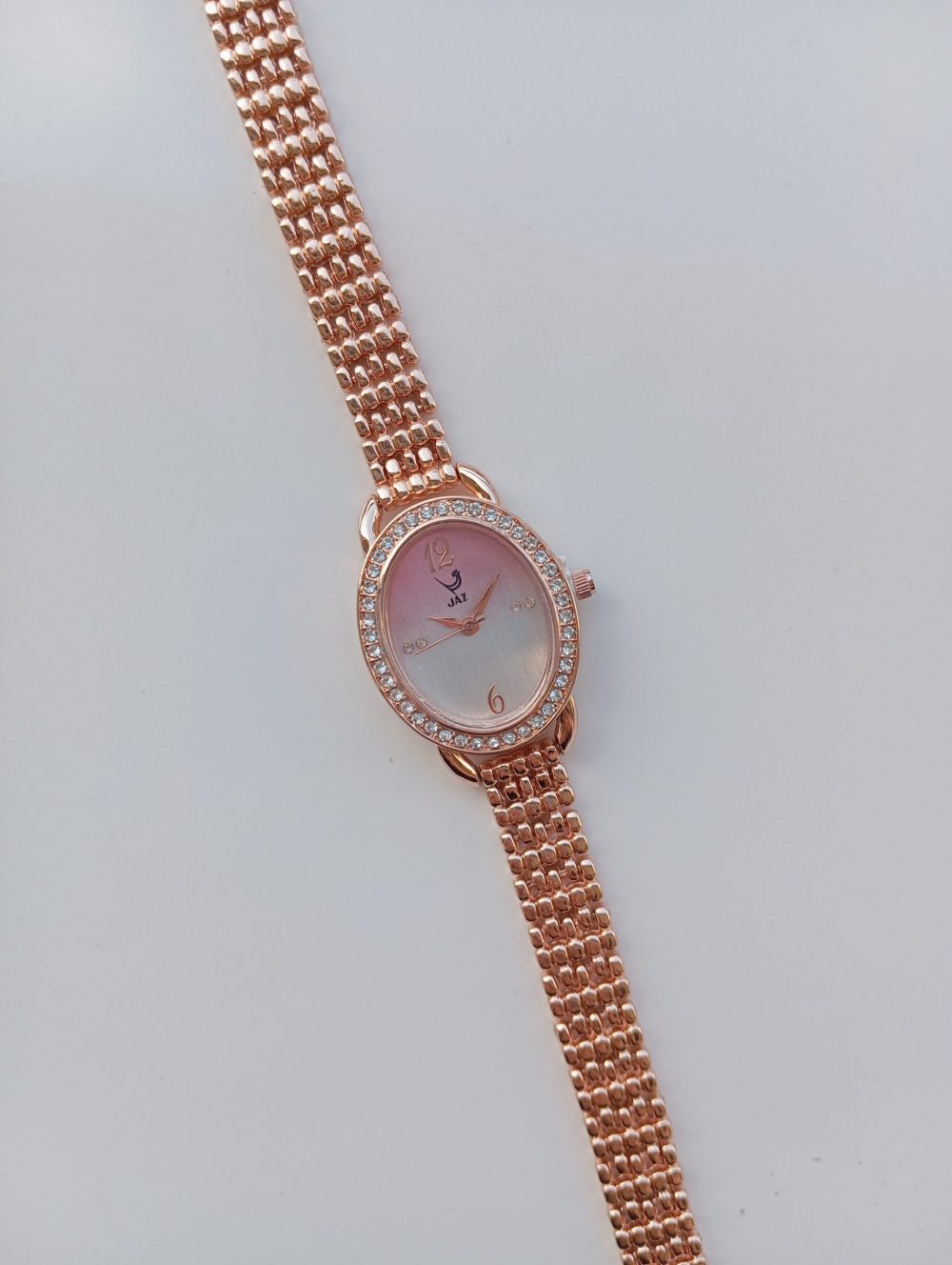 montre vintage rose poudrée jas