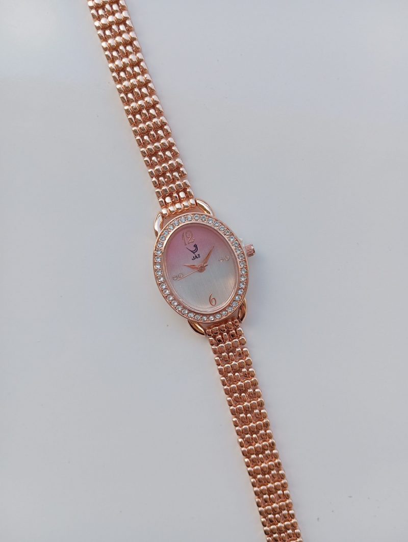 montre vintage rose poudrée jas